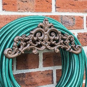 HI - Slanghouder - gietijzer - bruin