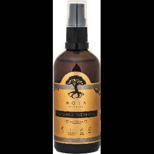 "Radiant Glow Natural Tanning Oil with Raspberry Seed & Mint"