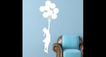 Muursticker woonkamer meisje balonnen Banksy