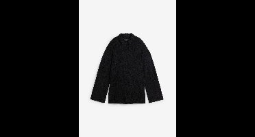 Oversized trui met col en zijsplitten