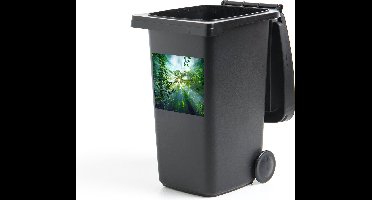 Container sticker De zon schijnend door de bossen van een regenwoud in Maleisië - 40x40 cm - Kliko sticker