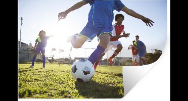 Muurstickers - Sticker Folie - Jongen voetbalt - 30x20 cm - Plakfolie - Muurstickers Kinderkamer - Zelfklevend Behang - Zelfklevend behangpapier - Stickerfolie