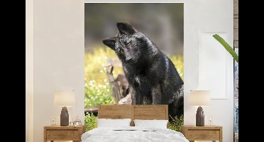 Behang - Fotobehang Wolf - Zwart - Gras - Breedte 160 cm x hoogte 240 cm