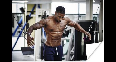 Poster Een gespierde man is aan het trainen - 30x20 cm