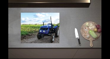 Inductieplaat Beschermer - Blauwe Traktor geparkeerd langs Weiland vol Gewassen onder Schapen Bewolking - 60x52 cm - 2 mm Dik - Inductie Beschermer van Vinyl