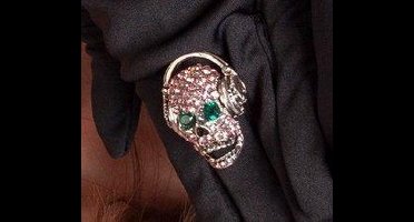 Ring doodskop met koptelefoon roze