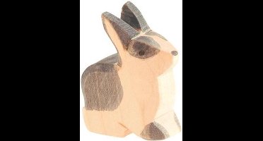 Konijn zwart gevlekt zittend Ostheimer