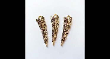 3 goudkleurige veren