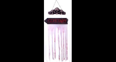 Bord met tekst CEMETARY met doodshoofden