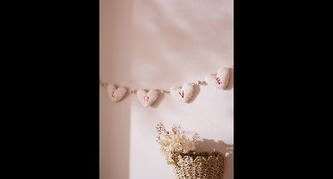 Slingerharten van katoenen gaas ecru