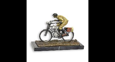 A BRONZE SCULPTURE OF A MAN ON A BIKE