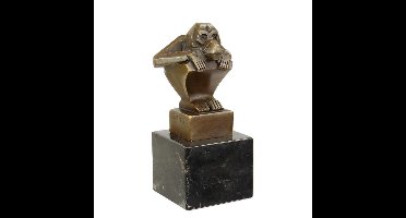 A BRONZE SCULPTURE OF A SQUATTING MONKEY