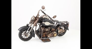 A TIN MODEL OF A MOTORCYCLE