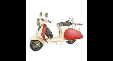 A TIN MODEL OF A SCOOTER