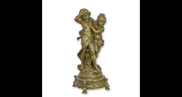 A BRONZE SCULPTURE OF A BOY AND GIRL