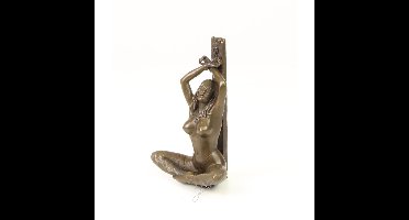 AN EROTIC BRONZE SCULPTURE OF A HANDCUFFED FEMALE NUDE