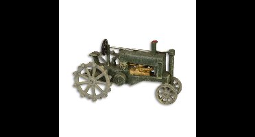 A CAST IRON MODEL OF A TRACTOR