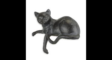 A RESIN FIGURINE OF A RECLINING CAT
