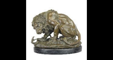 A BRONZE SCULPTURE OF A LION AND SERPENT