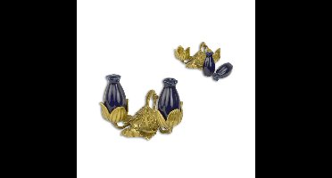 A BRONZE AND PORCELAIN SALT AND PEPPER SHAKER SET
