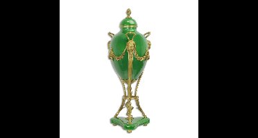 A BRONZE MOUNTED GREEN GROUND JAR AND COVER