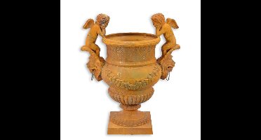 A RUSTY CAST IRON GARDEN URN