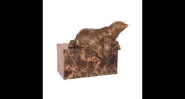 A BRONZE SCULPTURE OF A LYING POLAR BEAR