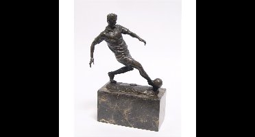 A BRONZE SCULPTURE OF A SOCCER PLAYER