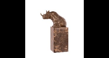 A BRONZE SCULPTURE OF A SITTING RHINOCEROS