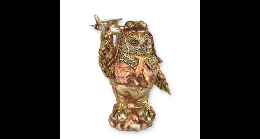 A RESIN STEAMPUNK FIGURINE OF AN OWL WITH AIRPLANE