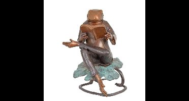 A BRONZE SCULPTURE OF A READING FROG