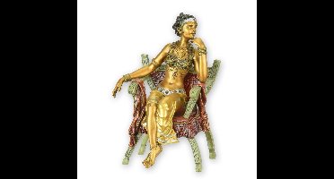 A BRONZE SCULPTURE OF A WOMAN IN A CURULE CHAIR
