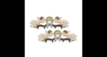 een paar gietijzeren jashaken met engelen