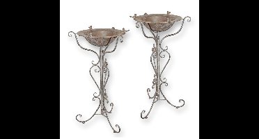 A PAIR OF IRON BIRD BATHS