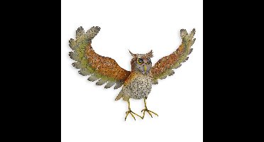 A METAL OWL SPREADING HIS WINGS