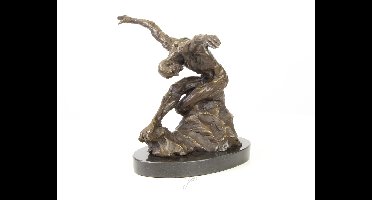 A MODERNIST BRONZE SCULPTURE OF A NUDE MALE DANCER